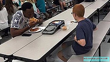 The touching gesture of an American football player with a child with autism: a true hero