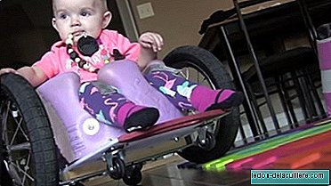They made a homemade wheelchair for their 13-month-old daughter with paralysis (and dominates it that well)