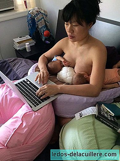 The inspiring photo of an artist that shows that motherhood doesn't have to be at odds with reaching your dreams