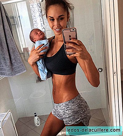 Fitnes mama je spet tarča kritik zaradi fotografiranja selfija, ne da bi držala otroka za glavo