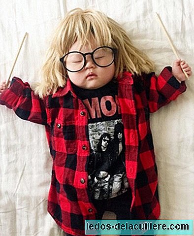 The funny pictures a mother takes of her baby while she takes a nap