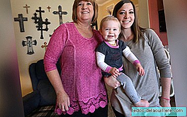 A woman who was a surrogate mother celebrates the first birthday of the granddaughter she gave birth