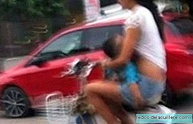 Breastfeeding in public is one thing, doing it while driving a motorcycle is very different
