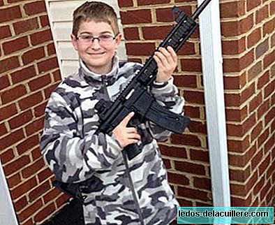 O pai dessa criança é instrutor de armas, então o pequeno 'não corre o risco de ter um rifle nas mãos?'