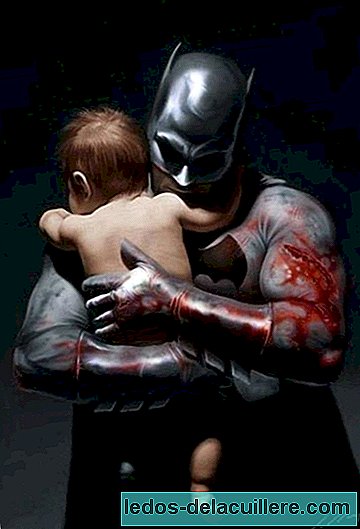Even the toughest men (like Batman) soften when they have a baby