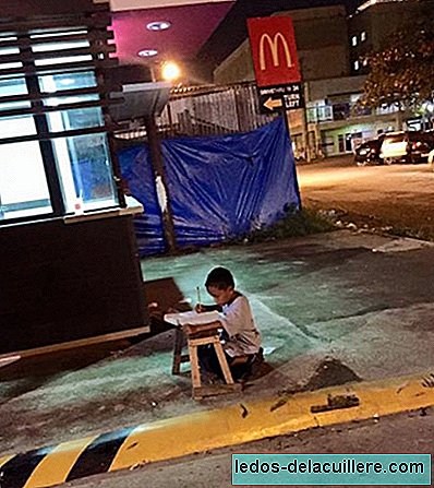 The photo of a homeless boy doing homework in the light of a McDonald's becomes inspiration for thousands of people