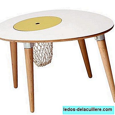 Children's table with toy basket