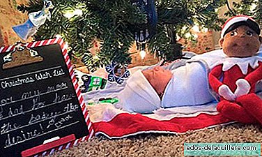 Parents surprise their three daughters with a very special gift under the Christmas tree: an adopted baby