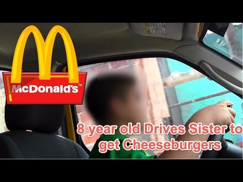 After learning to drive on YouTube with 8 years, he goes with his little sister to eat hamburgers